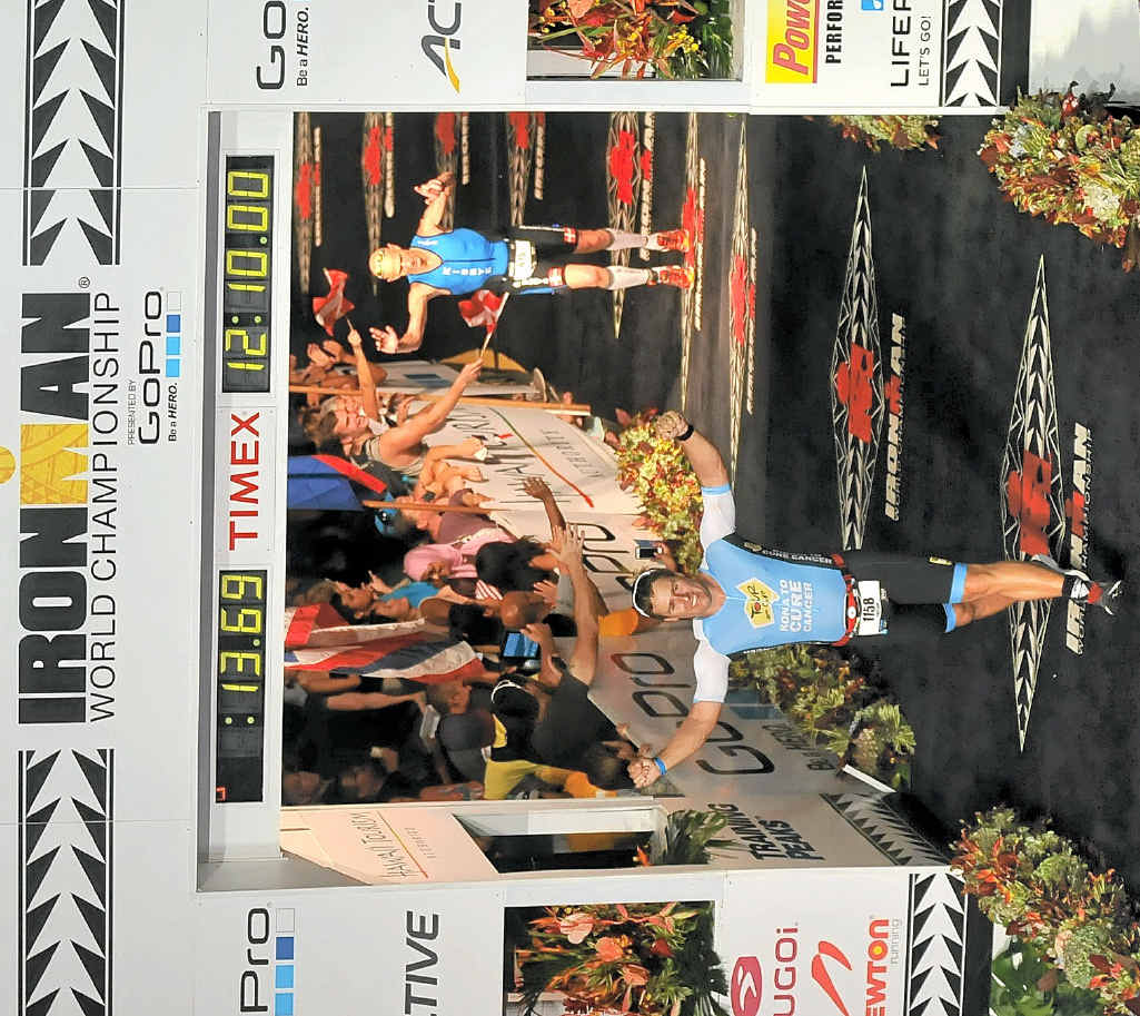 HUGE EFFORT: Relief at last as Sinclair Black completes the Hawaii Ironman. contributed HUGE EFFORT: Relief at last as Sinclair Black completes the Hawaii Ironman. contributed